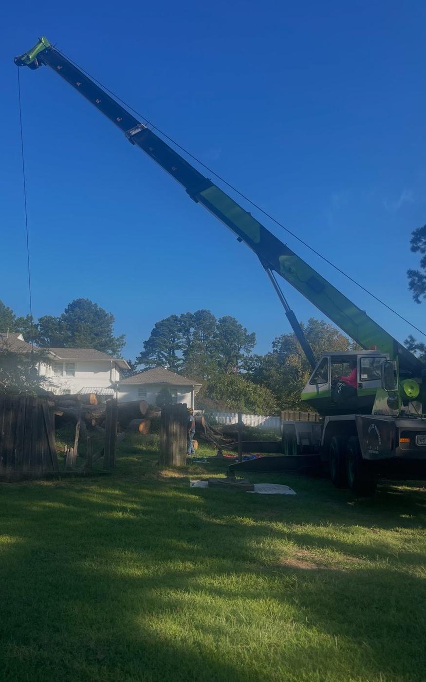 Aaron's Tree Service crane working a residential removal